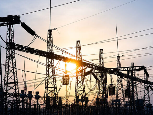 Impression network at transformer station in sunset