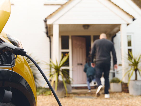 An electric vehicle charging at owner's home