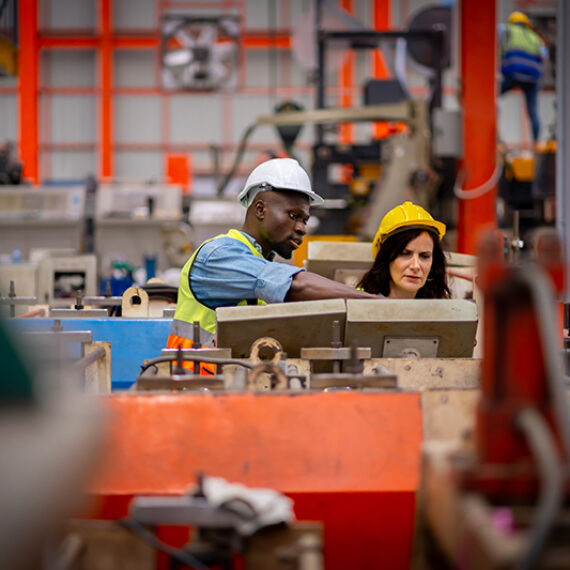 Workers at a sheet metal factory