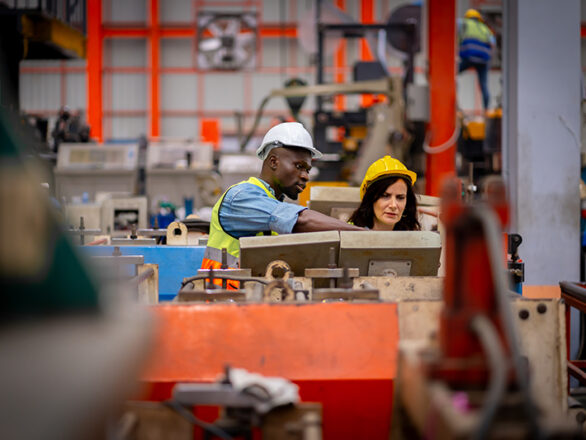 Workers at a sheet metal factory