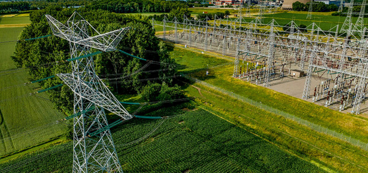 Aerial view of power lines leading to an industrial plant