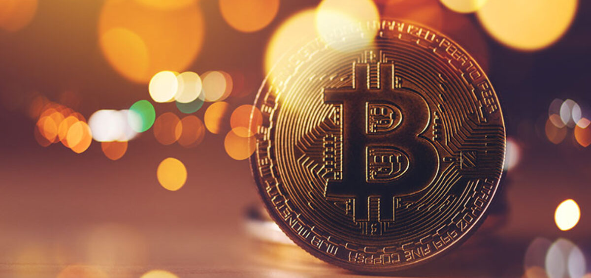 Image of a gold coin with a B to accompany an article on Bitcoin Mining Energy Use Explained