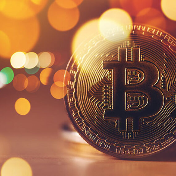 Image of a gold coin with a B to accompany an article on Bitcoin Mining Energy Use Explained