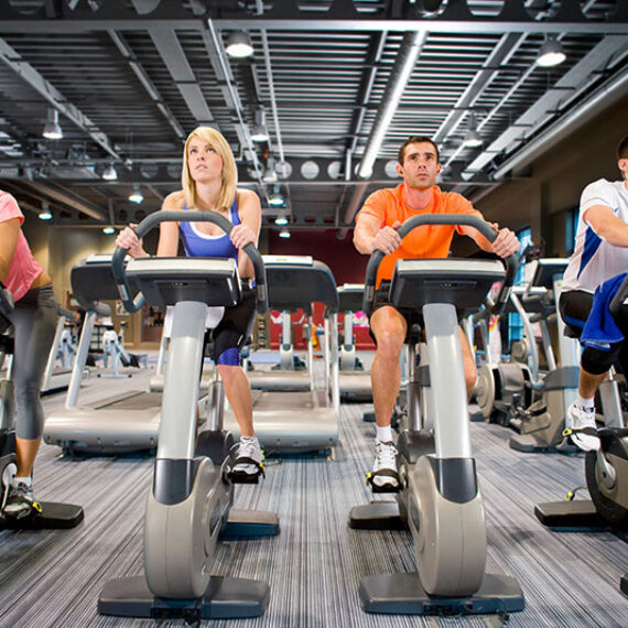 People working out on the bikes in comfort due to the Smart Electricity Metering at Gyms and Fitness Centres